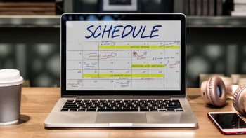 laptop-coworking-space-wth-schedule